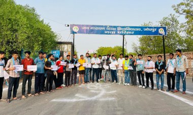 NSUI workers burnt the effigy of Education Minister Dharmendra Pradhan, demanding cancellation of NEET exam